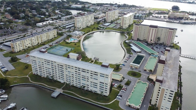 bird's eye view featuring a view of city and a water view