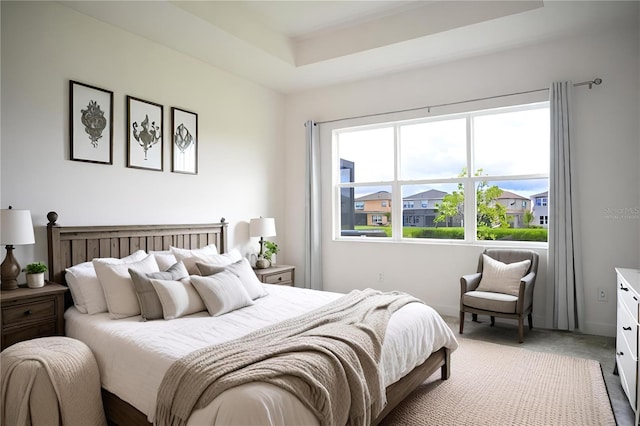 bedroom featuring light carpet