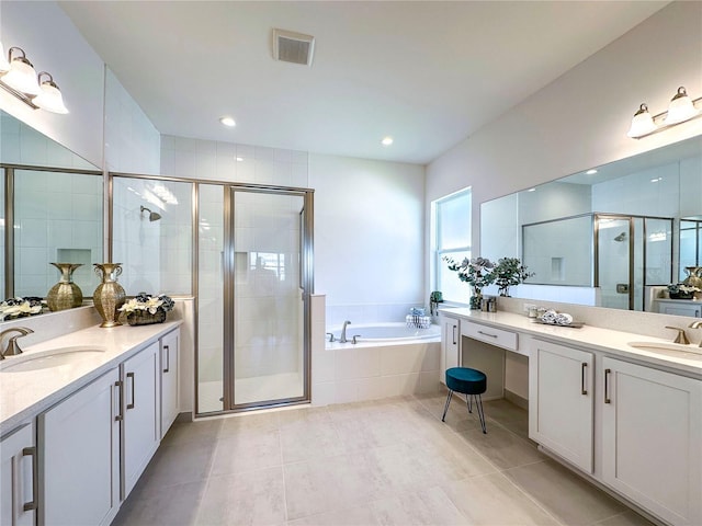 full bath with a sink, visible vents, a bath, and a shower stall