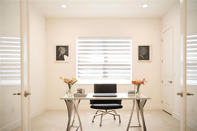 office with recessed lighting and baseboards