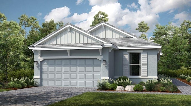 view of front of property with decorative driveway, a garage, board and batten siding, and stucco siding