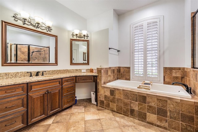 bathroom featuring tiled shower, a garden tub, and vanity