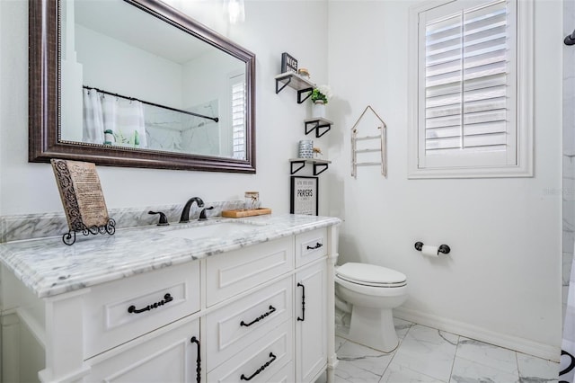 full bathroom with baseboards, toilet, a shower with curtain, marble finish floor, and vanity