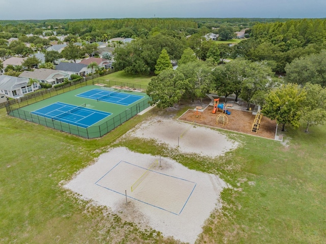 bird's eye view featuring a wooded view