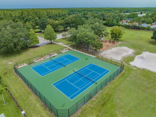 drone / aerial view with a view of trees