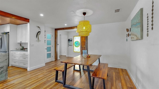 dining area with recessed lighting, visible vents, baseboards, and light wood-style flooring