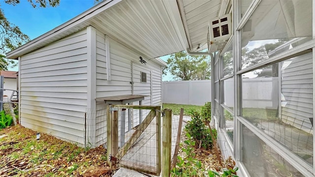 view of home's exterior featuring fence