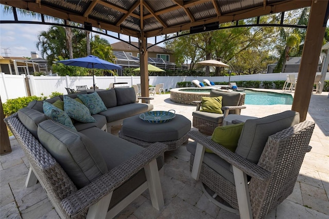 view of patio featuring a fenced in pool, a gazebo, outdoor lounge area, a fenced backyard, and an in ground hot tub