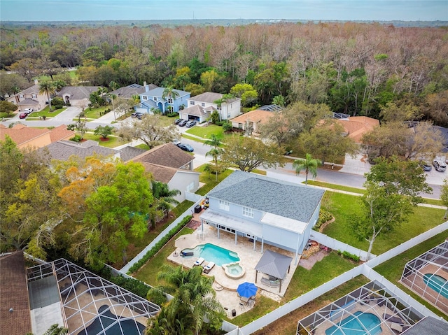 aerial view with a view of trees and a residential view