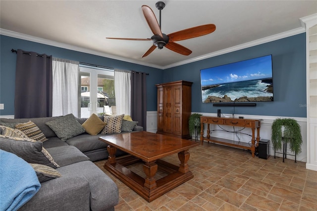 4859 Augusta Ave, Oldsmar, FL 34677 - living area with a ceiling fan, stone finish flooring, ornamental molding, and wainscoting