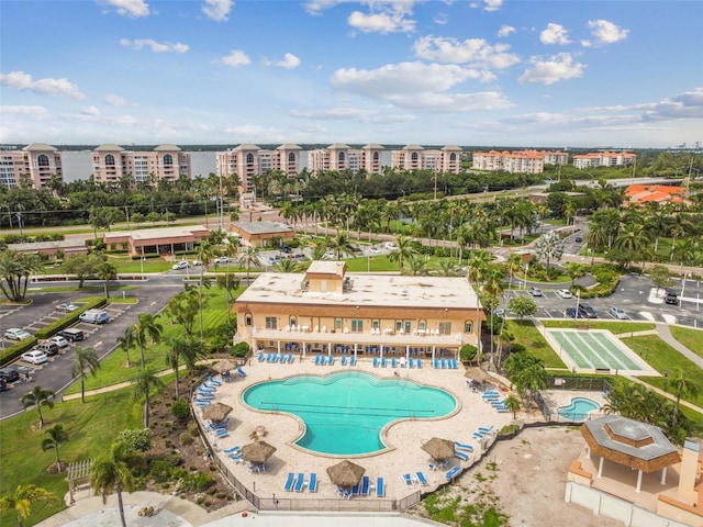 birds eye view of property featuring a city view