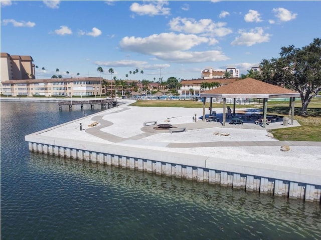 property view of water featuring an outdoor fire pit