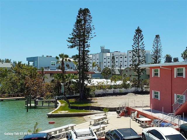 view of community with a water view