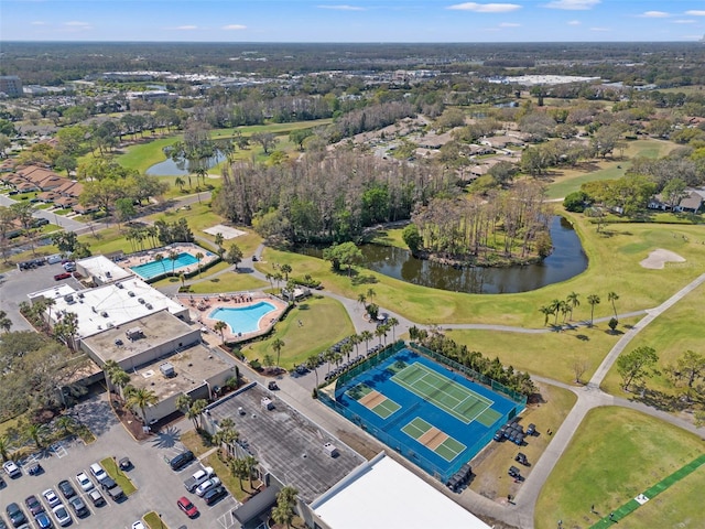 aerial view featuring a water view and golf course view