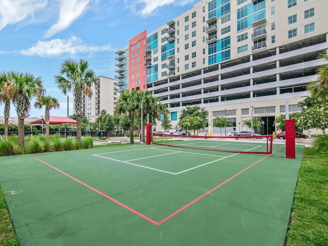 view of sport court with fence