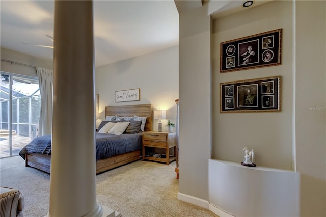 bedroom featuring carpet flooring, baseboards, and access to outside