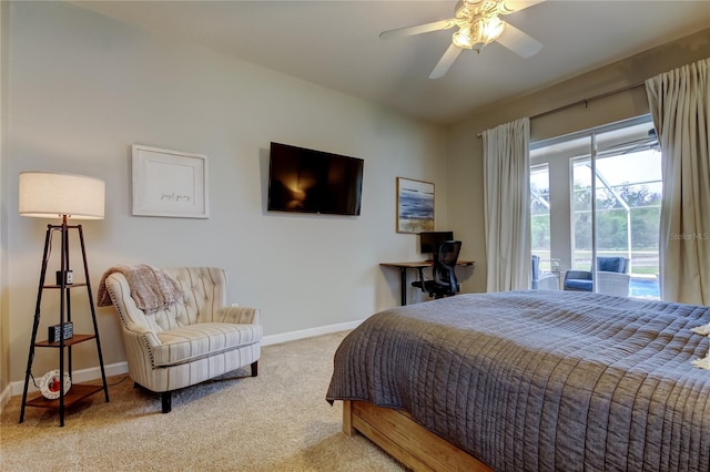 carpeted bedroom featuring access to outside, baseboards, and ceiling fan