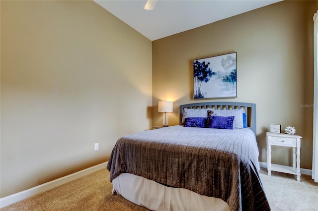 bedroom featuring baseboards and carpet floors