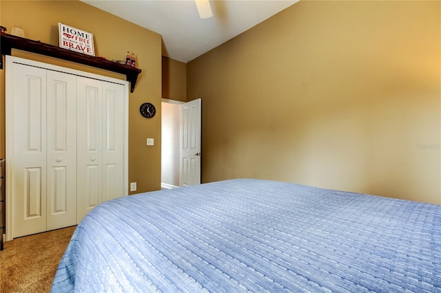 bedroom featuring a closet, carpet floors, and a ceiling fan