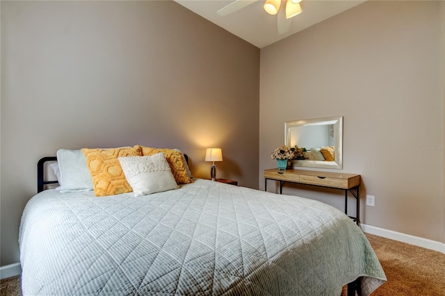 bedroom with carpet flooring, a ceiling fan, and baseboards