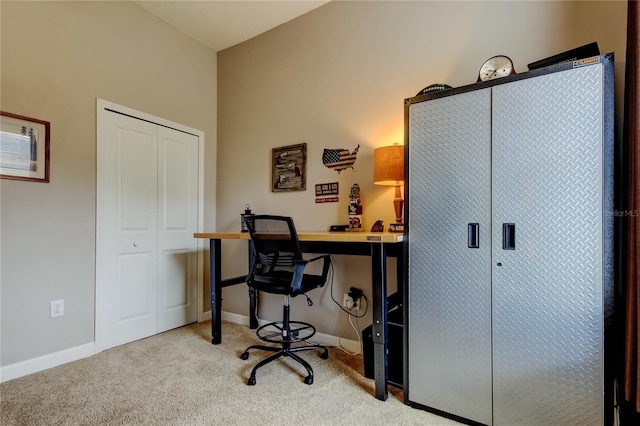 home office featuring baseboards and carpet floors