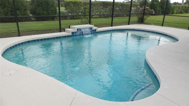 pool with a yard, a lanai, and a patio area