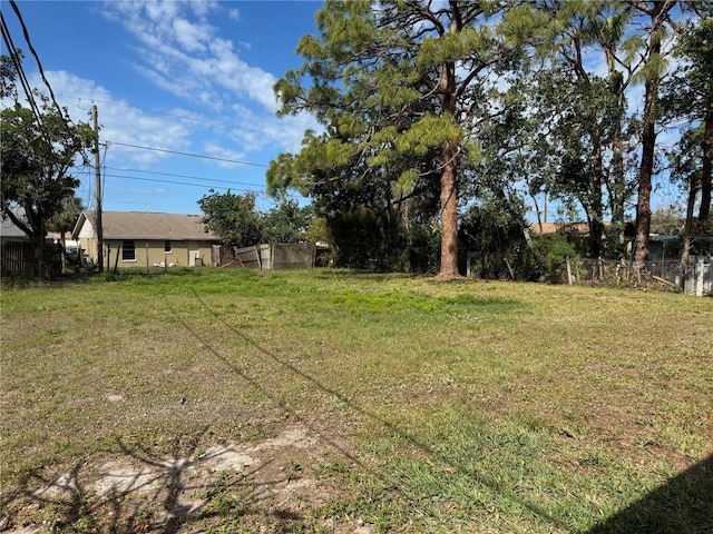 view of yard featuring fence