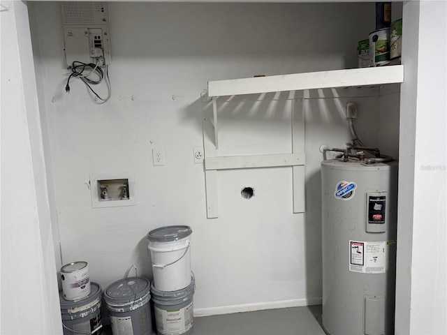 utility room featuring electric water heater