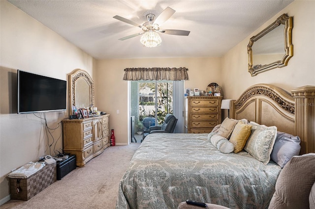 bedroom with access to exterior, baseboards, light carpet, and ceiling fan