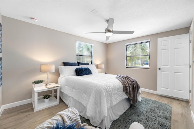 217 Emerald Ln, Largo, FL 33771 - bedroom featuring light wood finished floors, baseboards, and ceiling fan