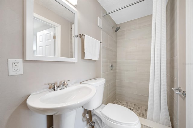 217 Emerald Ln, Largo, FL 33771 - bathroom with a stall shower and toilet