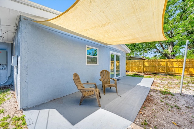 217 Emerald Ln, Largo, FL 33771 - view of patio featuring fence