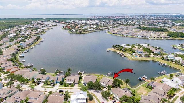 aerial view with a residential view and a water view