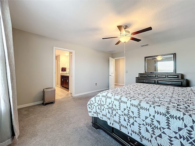 bedroom featuring baseboards, visible vents, ceiling fan, a textured ceiling, and light carpet