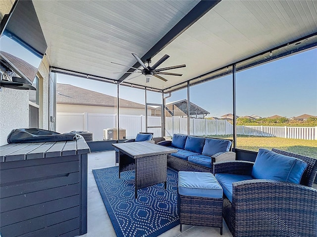 view of patio / terrace with outdoor lounge area, a fenced backyard, and ceiling fan