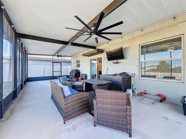 sunroom / solarium with ceiling fan