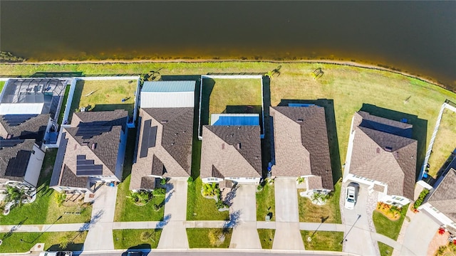 birds eye view of property with a residential view