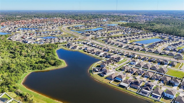 aerial view featuring a residential view and a water view