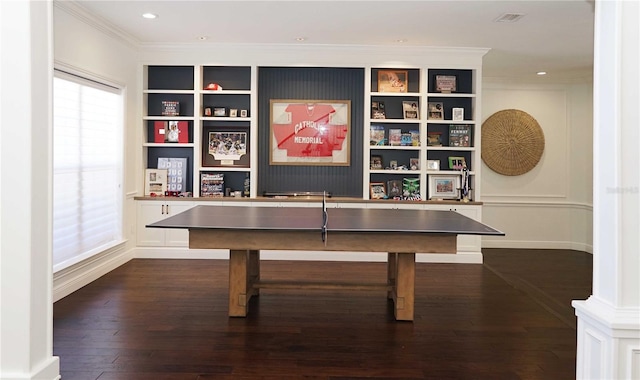 recreation room featuring visible vents, crown molding, built in features, recessed lighting, and dark wood-style flooring