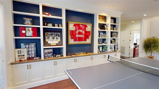 recreation room featuring recessed lighting, visible vents, built in shelves, and dark wood-style flooring