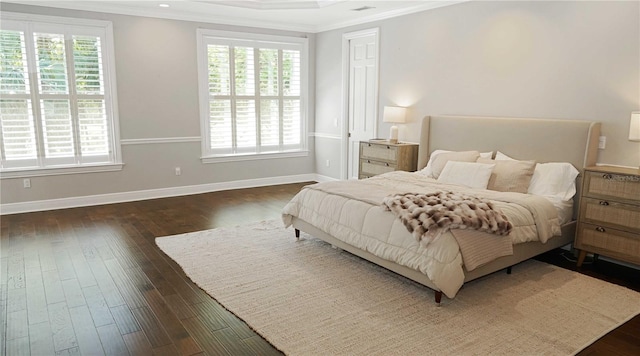 bedroom featuring crown molding, multiple windows, and dark wood-style floors