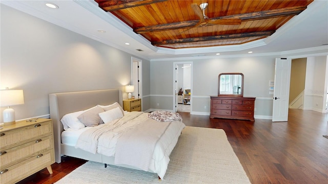 bedroom featuring wood finished floors, a tray ceiling, recessed lighting, wood ceiling, and crown molding