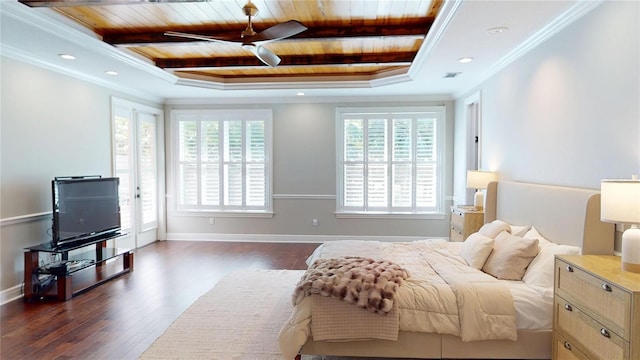 bedroom with baseboards, dark wood finished floors, ornamental molding, wooden ceiling, and a raised ceiling