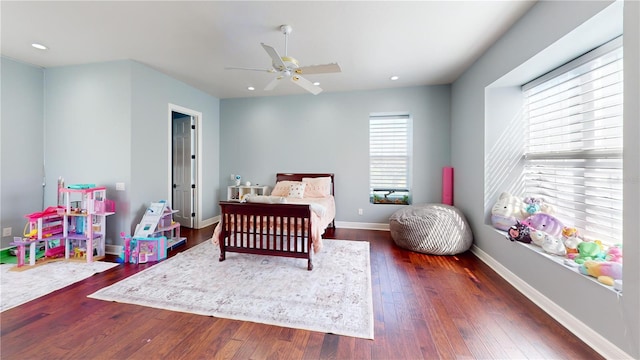 bedroom with recessed lighting, baseboards, ceiling fan, and dark wood-style flooring