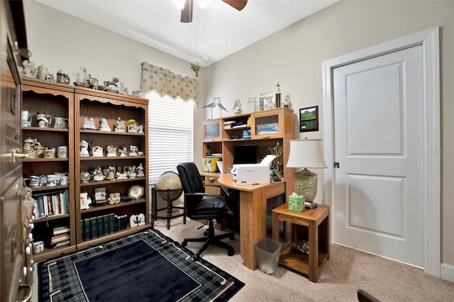 carpeted office with ceiling fan