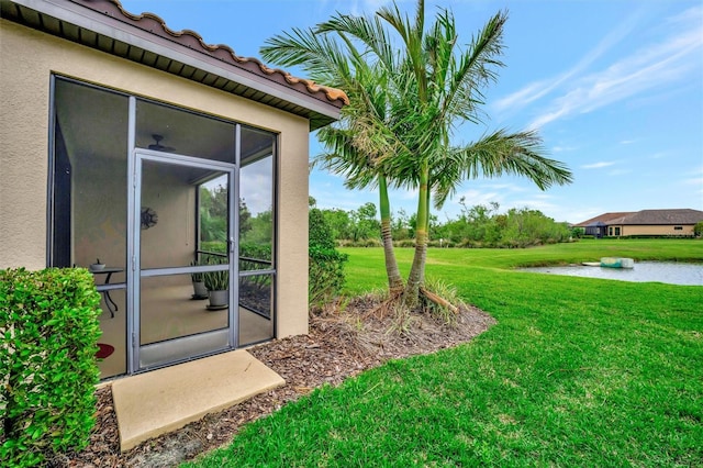 view of yard featuring a water view