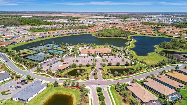 bird's eye view featuring a residential view and a water view