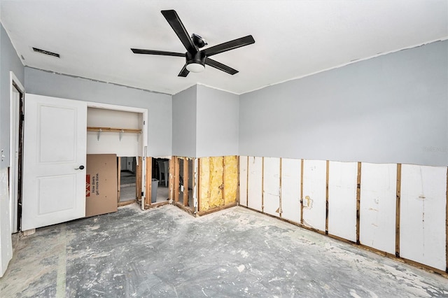 spare room featuring visible vents and ceiling fan