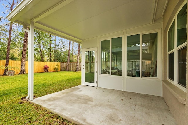 view of patio featuring fence