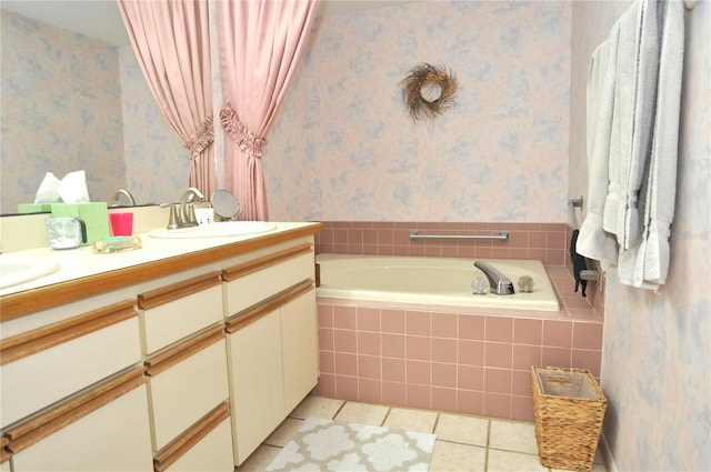 bathroom with wallpapered walls, double vanity, a sink, tile patterned flooring, and a bath